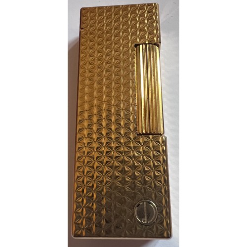 1338 - A gold plated Dunhill lighter together with Dunhill matches, butane gas, bad and leather pouch.