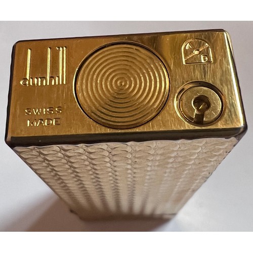 1338 - A gold plated Dunhill lighter together with Dunhill matches, butane gas, bad and leather pouch.