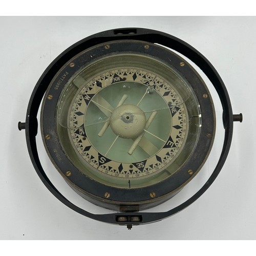 1340 - A gimbal mounted brass ship's compass PATT. 0995 No. 161K (23 cm d), together with a set of 2lb Aver... 