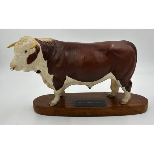 99 - A Beswick Hereford Bull, Connoisseur model on mount. Ht 18cm, mount 30cm l.