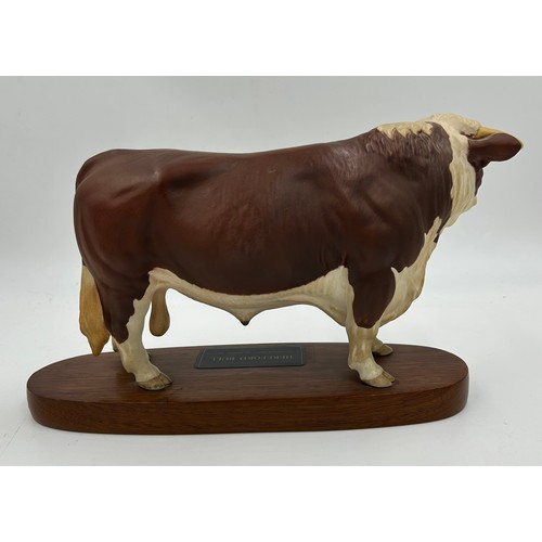 99 - A Beswick Hereford Bull, Connoisseur model on mount. Ht 18cm, mount 30cm l.