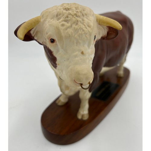 99 - A Beswick Hereford Bull, Connoisseur model on mount. Ht 18cm, mount 30cm l.