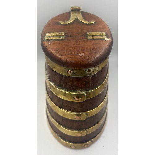 1344 - A coopered wooden barrel with hinged lift up lid and brass fittings. 20cm h.