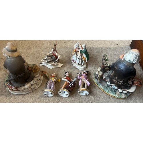 98 - Seven various Capodimonte figures together with a vintage leather cased Perdio transistor radio and ... 