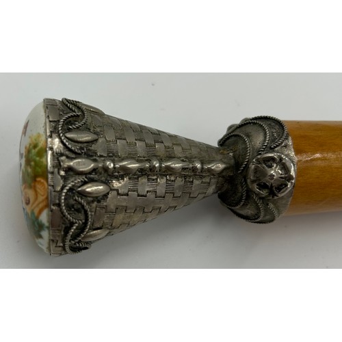 1347 - A sword stick with silver collar and millefiori knob, marks rubbed, 91cm l together with 3 other wal... 