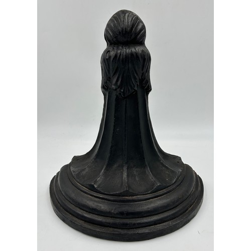 418 - A heavy cast iron doorstop, 34cm h.