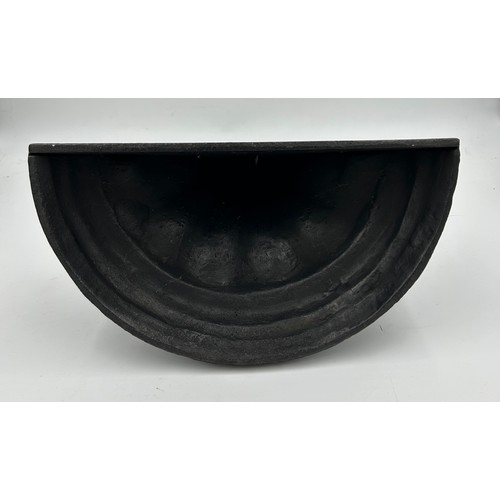 418 - A heavy cast iron doorstop, 34cm h.