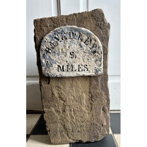 81 - A piece of stone with sign depicting ' Beverley 5 miles'.
39cm h x 21cm w x 16cm d.