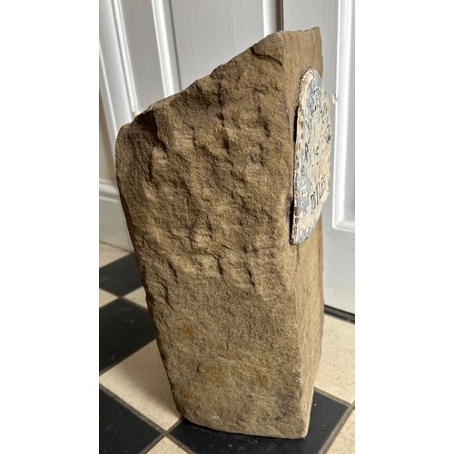 81 - A piece of stone with sign depicting ' Beverley 5 miles'.
39cm h x 21cm w x 16cm d.