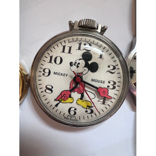 786 - Watches and pocket watch to include 2 x Disney Lorus Mickey mouse watches, a Mickey Mouse Bradley po... 