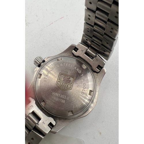 781 - A Tag Heuer Professional wristwatch with 18 carat gold and stainless steel bracelet. With spare link... 