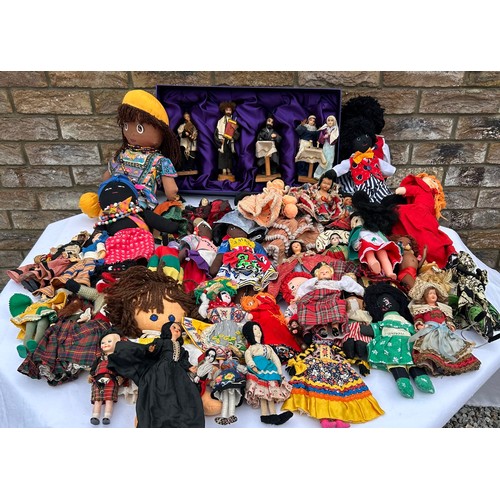 1196 - A quantity of mainly foreign/ tourist dolls to include knitted, wooden and plastic, some hand crafte... 