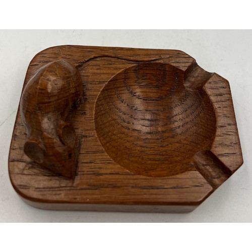 69 - A Robert Thompson of Kilburn, Mouseman ashtray with carved signature mouse. 10cm x 7.5cm.