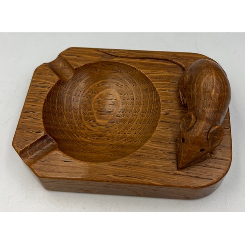 68 - A Robert Thompson of Kilburn, Mouseman ashtray with signature mouse. 10cm x 7.5cm.