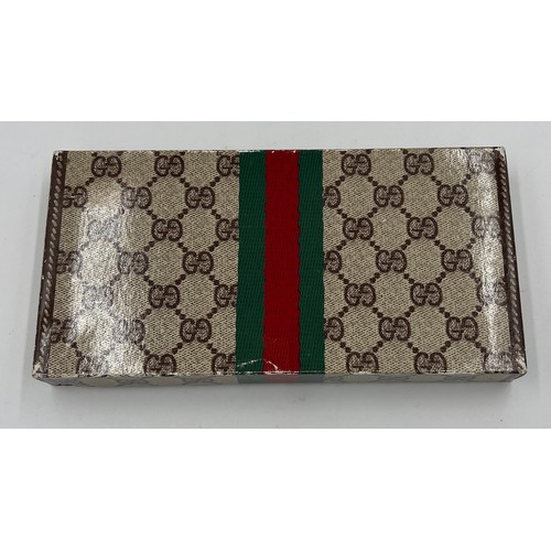 700 - Gucci glasses case in original presentation box. Case measures 17cm x 8cm.