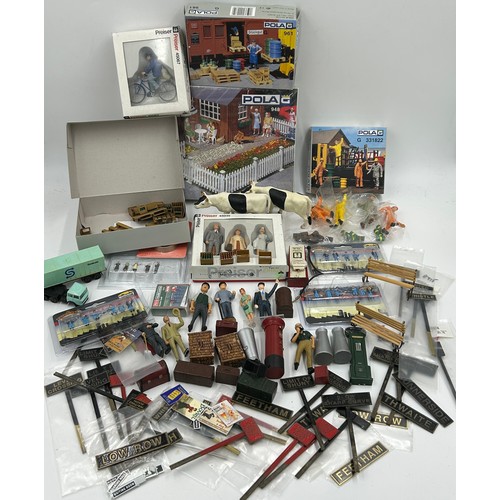 1228 - A collection of various miniature railway accessories to include model train metal railway signs, un... 