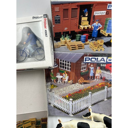 1228 - A collection of various miniature railway accessories to include model train metal railway signs, un... 