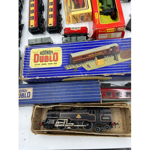 1204 - A quantity of vintage train carriages, engine, track etc to include Hornby Dublo, LLedo etc.