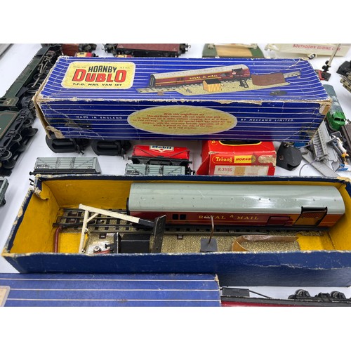 1204 - A quantity of vintage train carriages, engine, track etc to include Hornby Dublo, LLedo etc.