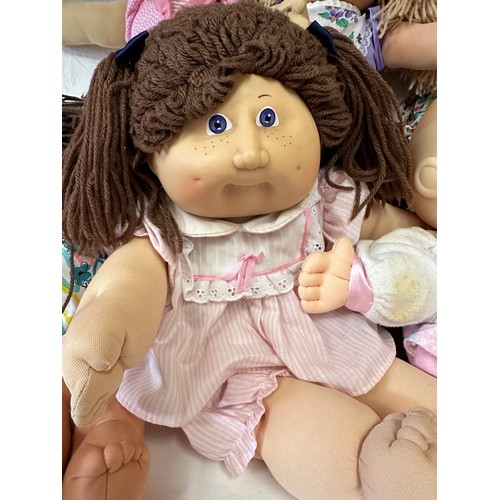 1205 - A collection of eight Cabbage Patch dolls together with a Mattel Boglins Flurp in original box.