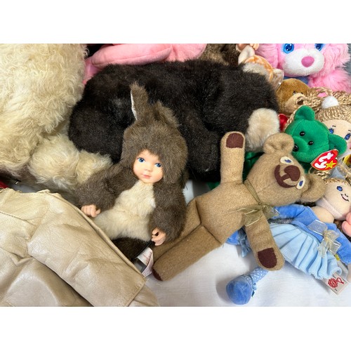 1203 - A collection of soft toys to include Keel, Brush a Love by Matchbox, Ty Beanie Babies, Anne Geddis, ... 