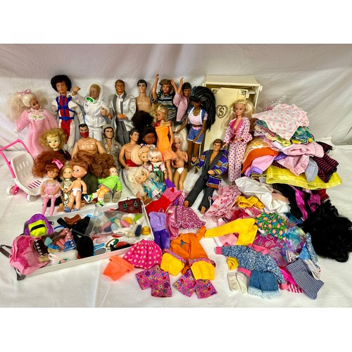 1201 - A mixed collection comprising of Barbies, Ken's and GI Joe along with some original Barbie clothes a... 