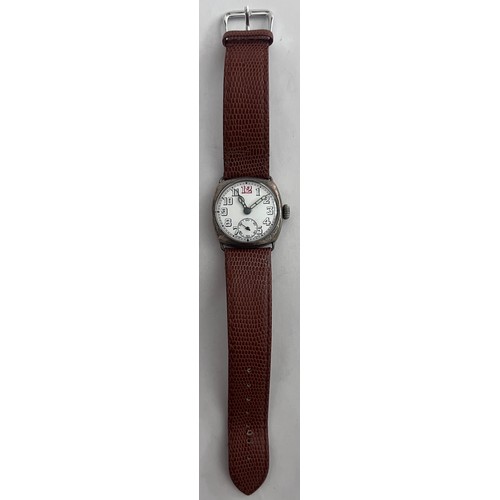 770 - A 1910'a gentleman's silver cased wristwatch on brown leather strap and subsidiary seconds dial with... 