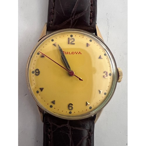 767 - A Bulova 1951 gentleman's wristwatch, 10k gold filled with red second hand on alligator calf strap i... 