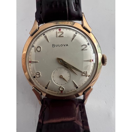 768 - A 1956 manual 10k gold plated Bulova NY Executive Retro Curvex wristwatch with subsidiary seconds di... 