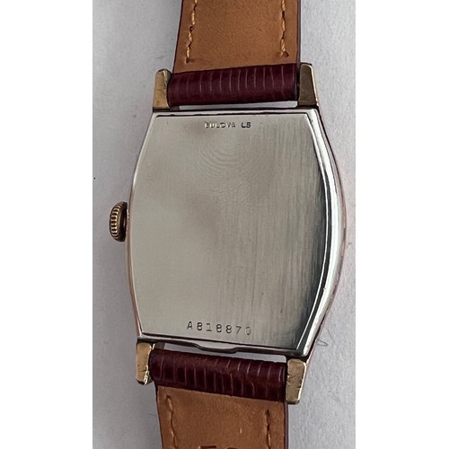 762 - A 1955 manual 'Senator' Bulova wristwatch with subsidiary seconds dial, rectangular face and fluted ... 