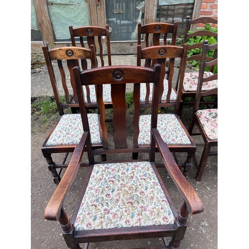 15 - A set of six ladder backed dining chairs together with five oak dining chairs with drop in seats to ... 