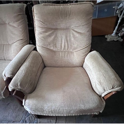 18 - An Ercol teak three seater upholstered sofa and single armchair.