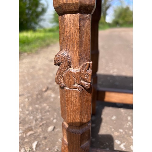 71 - Wilf Hutchinson & Son Squirrelman oak stool with adzed top together with an unmarked oak tripod tabl... 