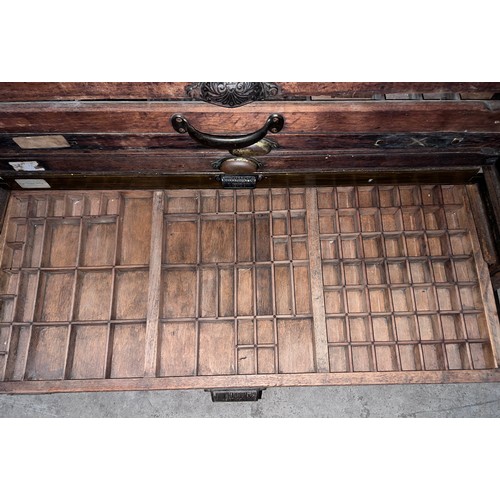 2 - An oak printers chest with 20 drawers and multiple printing blocks. Labelled T.C Thompson & Son Ltd.... 