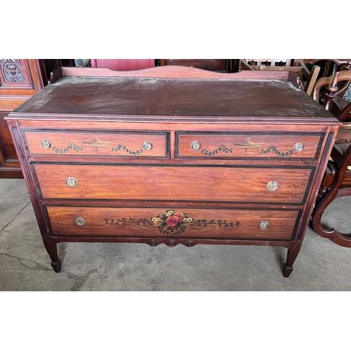 3 - An American chest of two short over two long drawers with painted floral decoration to front. Labell... 