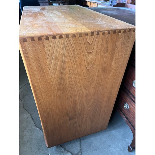 4 - Ercol television cabinet with pull out shelf to base.