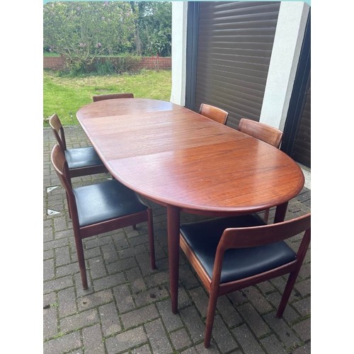 7 - A Skovmand & Anderson Danish teak D end pull out extending dining table with 6 Johannes Norgaard's c... 