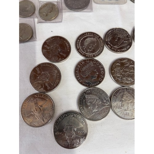 839 - A collection of coins to include 24 x 5 pound coins, various crowns, various foreign currency etc.