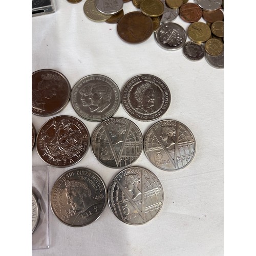 839 - A collection of coins to include 24 x 5 pound coins, various crowns, various foreign currency etc.