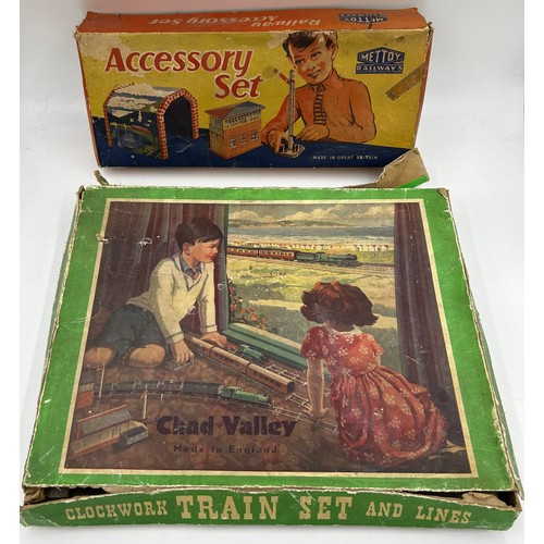 1107 - Chad Valley Clockwork Train Set and Lines together with a Mettoy Tin Plate Railway Accessory Set con... 