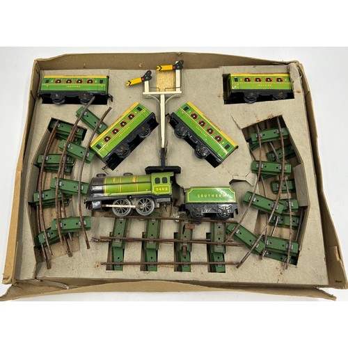 1107 - Chad Valley Clockwork Train Set and Lines together with a Mettoy Tin Plate Railway Accessory Set con... 