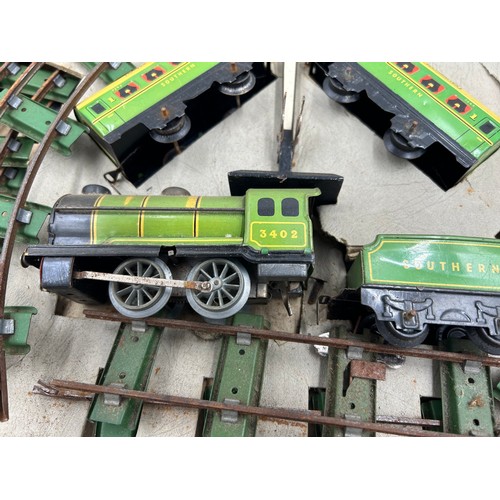 1107 - Chad Valley Clockwork Train Set and Lines together with a Mettoy Tin Plate Railway Accessory Set con... 