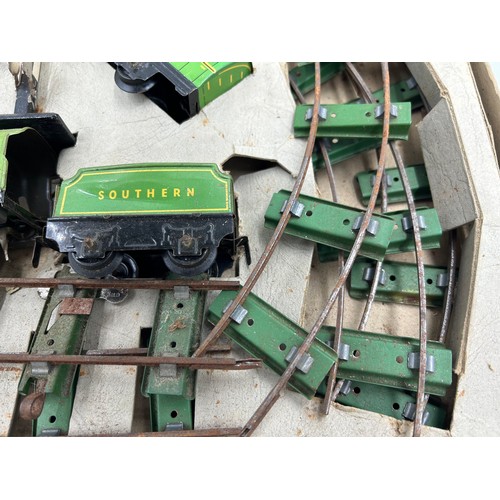 1107 - Chad Valley Clockwork Train Set and Lines together with a Mettoy Tin Plate Railway Accessory Set con... 