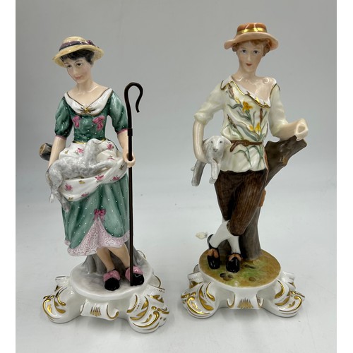 90 - Two Royal Crown Derby figures of shepherdess with lambs and detachable metal crook. Signed Joan Lee.... 