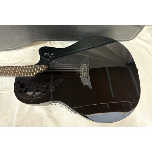 An Ovation Tangent T-257 electric guitar with an Ovation guitar case.