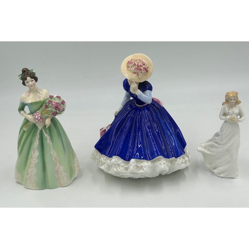 88 - Eleven Royal Doulton figurines to include: Figure of the Year 2004 Classics Susan HN4532,1993 Specia... 