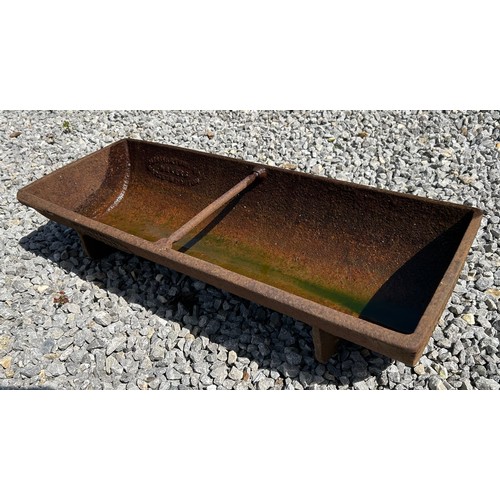 84 - A local vintage cast iron free standing water/food trough. Manufactured by Merkin & Tomkins, Market ... 