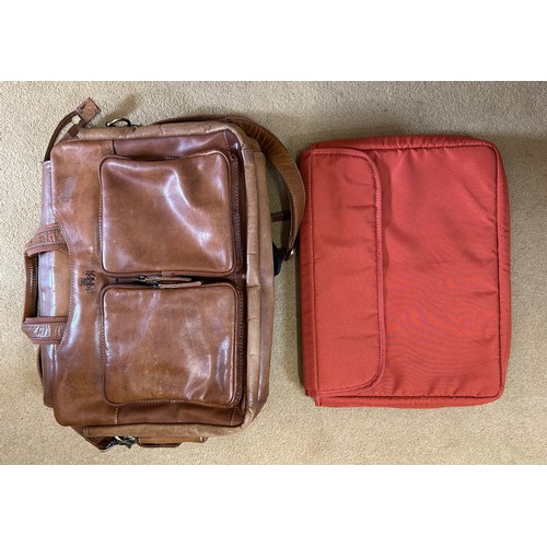 726 - A Rowallan brown leather laptop case with multiple zipped pockets and padded laptop cover, along wit... 