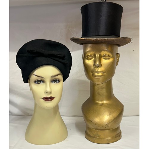 730 - A collection of various hats to include a collapsible opera top hat, a silk pleated lilac hat with a... 