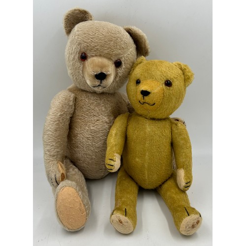 1108 - Two vintage jointed teddy bears. Largest with growler approx. 61cm l, smallest 45cm l.